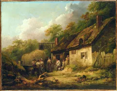 Oil painting of a rustic countryside inn scene. A thatched-roof whitewashed cottage with two brick chimneys serves as a wayside inn, identified by a hanging bell sign on a wooden post. Several figures in 18th-century rural clothing gather outside — some standing and conversing near a haycart, others seated by the inn's entrance with a dog. A wooded hillside rises behind the building under a partly cloudy sky. A small stream or puddle is visible in the foreground. The painter's signature appears in the lower right corner.